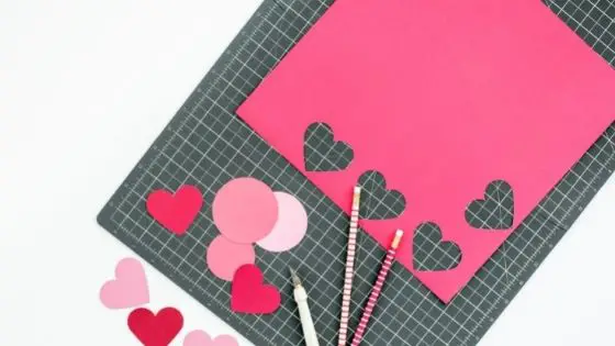 Red and pink hearts cut outs from a piece of paper