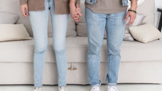 Couple standing holding hands