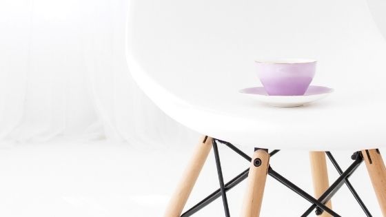 Cup of tea on a white chair