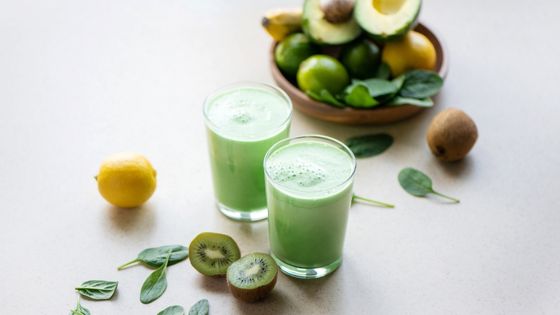 Variety of healthy juices, fruits and vegetables on a table